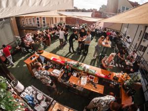 an overhead view of a crowd of people at a bar at Chillout Hostel Zagreb in Zagreb
