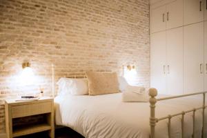 A bed or beds in a room at Selecta Apart ideal y facil parking en la calle
