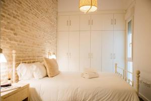 A bed or beds in a room at Selecta Apart ideal y facil parking en la calle