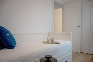A bed or beds in a room at Selecta Apart ideal y facil parking en la calle