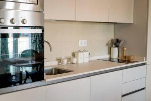 A kitchen or kitchenette at Selecta Apart ideal y facil parking en la calle