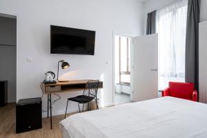 TV a/nebo společenská místnost v ubytování Beverly Hills Hotel