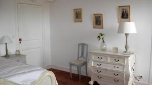 Llit o llits en una habitació de Gîte du Domaine du Ru