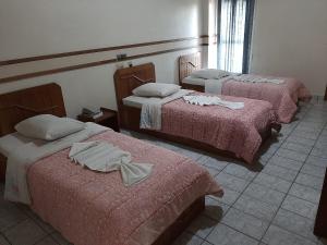Krevet ili kreveti u jedinici u okviru objekta Tulipa Hotel