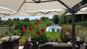 The swimming pool at or close to GARDAWORLD