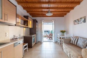 A cozinha ou cozinha compacta de Sea Wind Villas and Suites