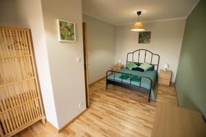 Posteľ alebo postele v izbe v ubytovaní Apartament Ventus Business and Living 44