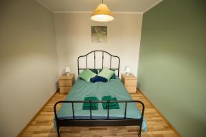 Posteľ alebo postele v izbe v ubytovaní Apartament Ventus Business and Living 44