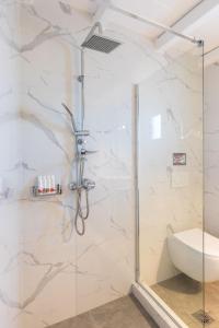 Um banheiro em Sea Wind Villas and Suites