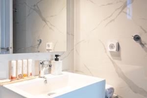 Um banheiro em Sea Wind Villas and Suites