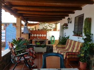 Posedenie v ubytovaní Cortijo Porroncico