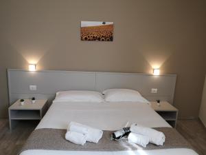 Posteľ alebo postele v izbe v ubytovaní Hotel & Wellness Stella Delle Langhe