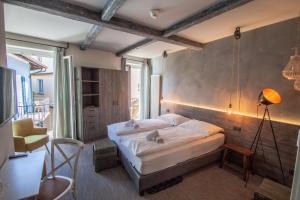 Letto o letti in una camera di Seven Boutique Hotel