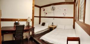 Katil atau katil-katil dalam bilik di Share B&B