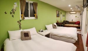 Katil atau katil-katil dalam bilik di Share B&B