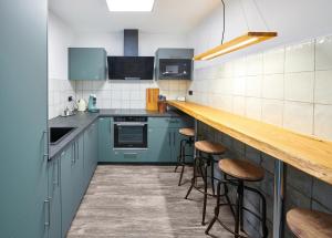 Η κουζίνα ή μικρή κουζίνα στο Excellentas Apartments Hannover