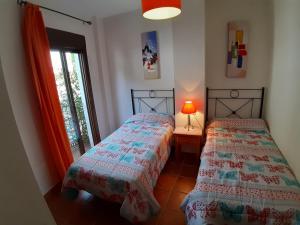 Un pat sau paturi într-o cameră la Casa del Lavadero +41 fotografii