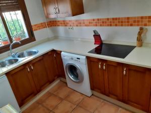 O bucătărie sau chicinetă la Casa del Lavadero