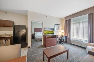 Posezení v ubytování Cobblestone Hotel & Suites - Austin