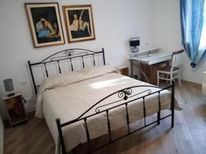 A bed or beds in a room at ASFODELIA-STELLA