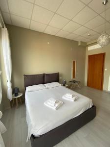 Postel nebo postele na pokoji v ubytování B&b note di mare