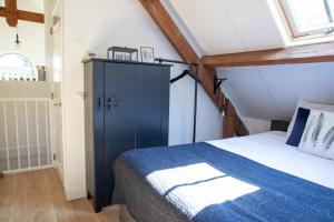 En eller flere senge i et værelse på Bed & Breakfast Monument076 Etten-Leur