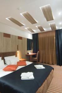 Postel nebo postele na pokoji v ubytování Hotel Viva + 37 fotografií