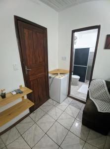 Posezení v ubytování Casa Thayla Pousada