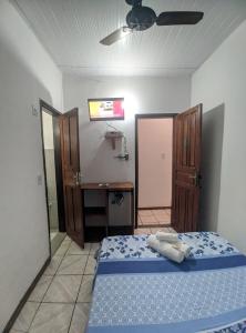 Postel nebo postele na pokoji v ubytování Casa Thayla Pousada