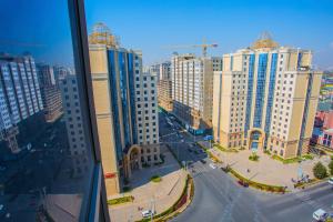 a view of a city with tall buildings at HOTEL AYNI in Dushanbe