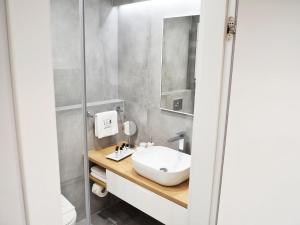Kúpeľňa v ubytovaní LM Ventus Apartment