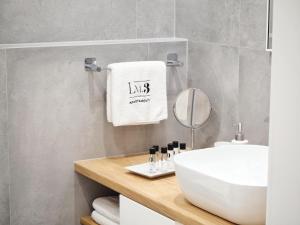 Kúpeľňa v ubytovaní LM Ventus Apartment + 18 fotografií