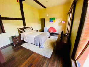 Un ou plusieurs lits dans un hébergement de l'établissement Hotel Pousada Joao de Barro