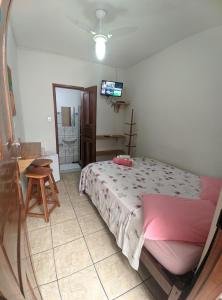 Postel nebo postele na pokoji v ubytování Casa Thayla Pousada