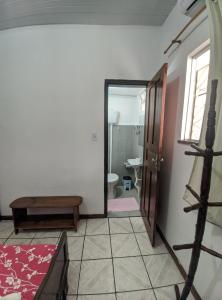 Postel nebo postele na pokoji v ubytování Casa Thayla Pousada