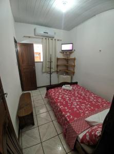 Postel nebo postele na pokoji v ubytování Casa Thayla Pousada