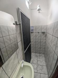 Koupelna v ubytování Casa Thayla Pousada