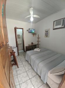 Postel nebo postele na pokoji v ubytování Casa Thayla Pousada