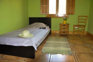 מיטה או מיטות בחדר ב-Casa Buena Vista - Campo de Ricote