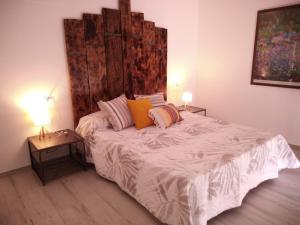 Säng eller sängar i ett rum på Il Porto di Benny