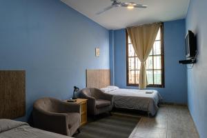 Cama ou camas em um quarto em Desert Nights Hostel