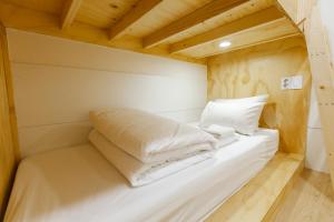 Ein Bett oder Betten in einem Zimmer der Unterkunft Step Inn Myeongdong 1