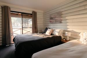 Postel nebo postele na pokoji v ubytování Palmers Lane Estate Hunter Valley + 37 fotografií