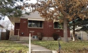 a red brick house with a tree in front of it at HEART OF Denver*Sleeps 10 in Denver