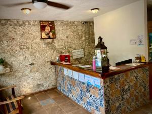 Nápoje v ubytování Yaxche Centro Hostal y Camping
