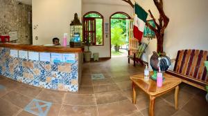 Posezení v ubytování Yaxche Centro Hostal y Camping