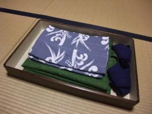 a box filled with green and blue paper at Sumiyoshiya in Kanazawa