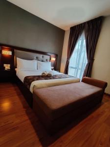 Postel nebo postele na pokoji v ubytování Castello Hotel