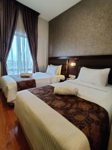 Postel nebo postele na pokoji v ubytování Castello Hotel