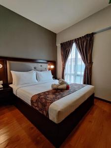 Postel nebo postele na pokoji v ubytování Castello Hotel